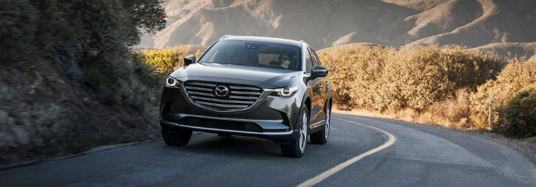 mazda cx-9 on highway road
