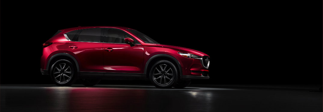 red mazda cx-5 in shadows