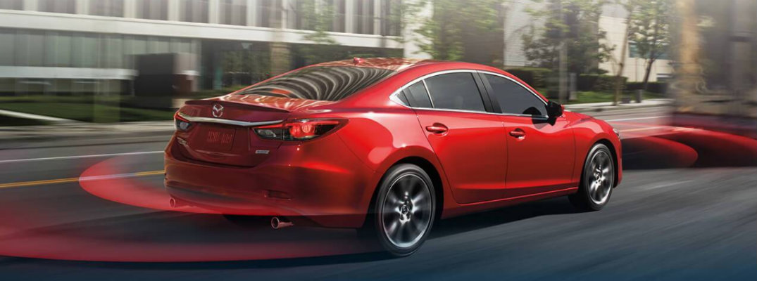View of Mazda6 showing how i-ACTIVSENSE would work with radar reverberating from the vehicle