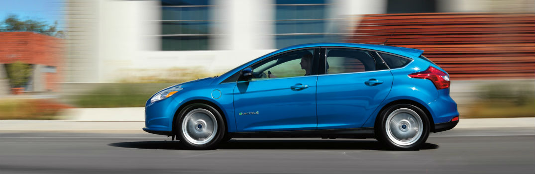 Blue 2013 Ford Focus Driving Down the Road