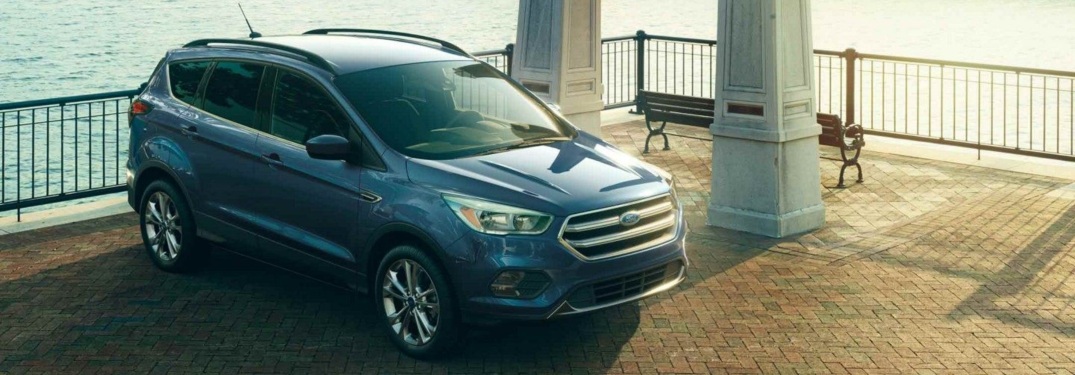 2018 Ford Escape parked in front of water and city skyline