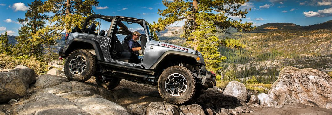 gray Jeep Wrangler driving off road