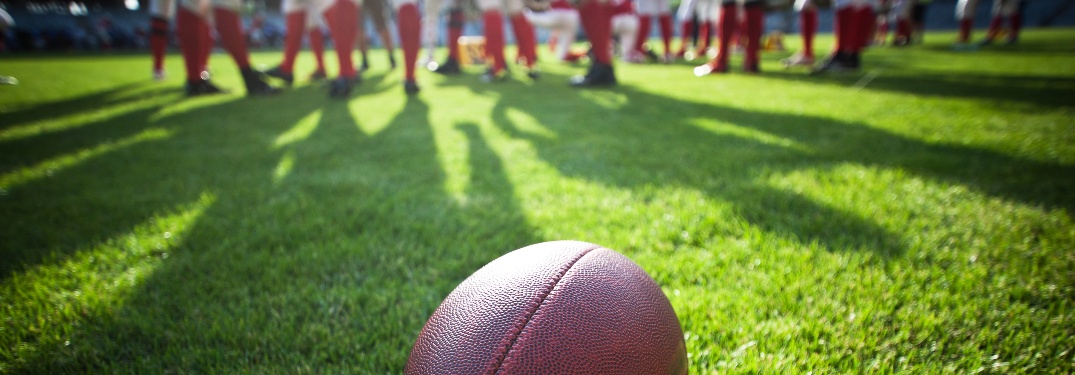 Football and Players on a Field