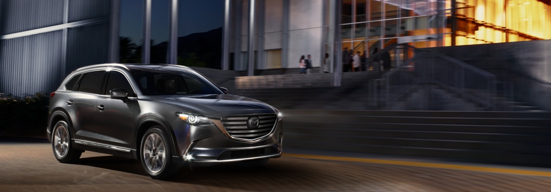 2019 Mazda CX-9 parked in front of a building at night