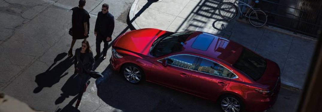 2020 Mazda6 parked and waiting for crossing passengers