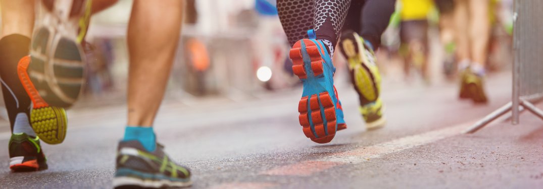 Close-up on the legs of a group of runners
