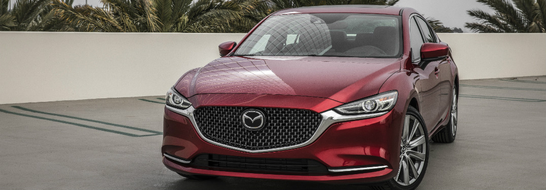 front view of red 2018 mazda6 in parking lot
