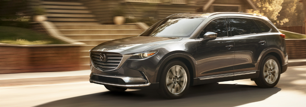 front and side view of blue 2019 mazda cx-9