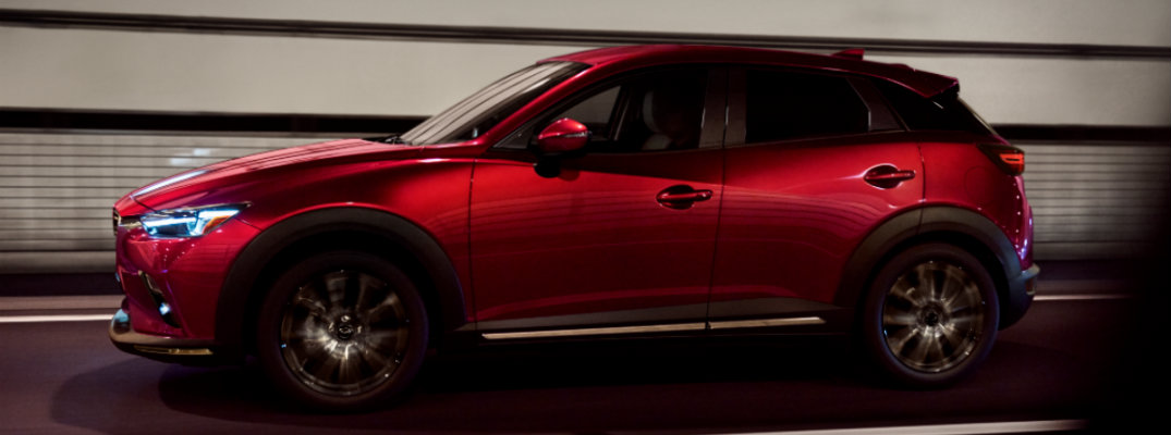 Full profile view of red 2019 Mazda CX-3