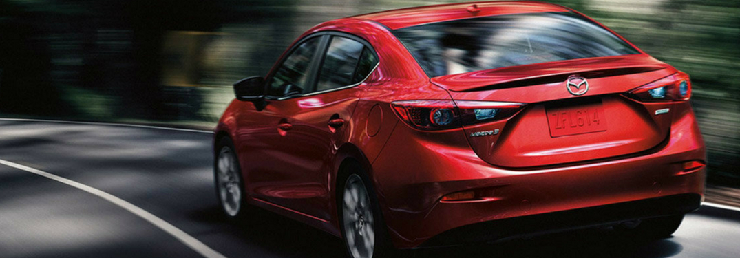2018 Mazda3 full view driving away