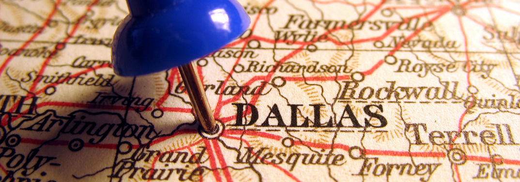 Road Trip Destinations in Texas with an image of a pin marking Dallas, TX on a map