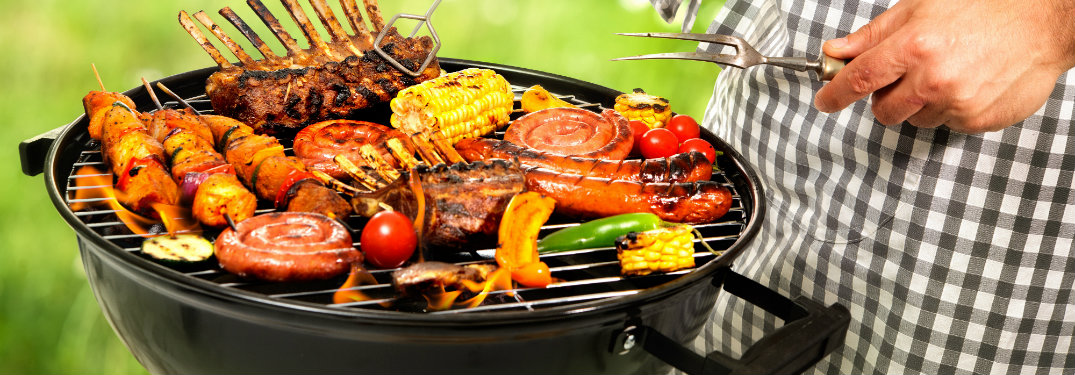 man grilling food