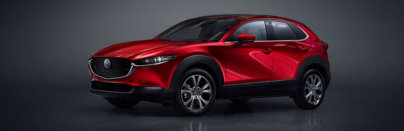 red mazda cx-30 side view