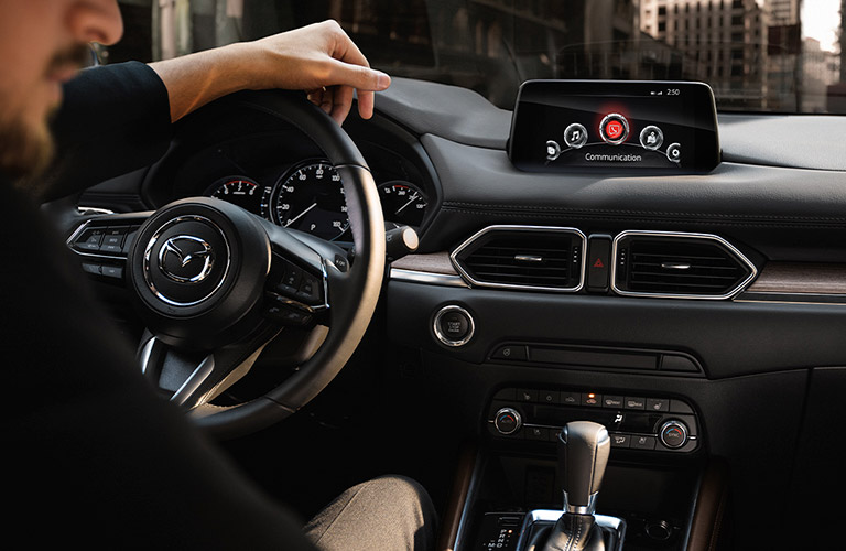 person behind the wheel of a 2020 Mazda CX-5