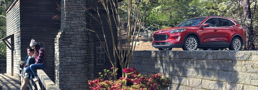 2020 Ford Escape parked on platform by young couple