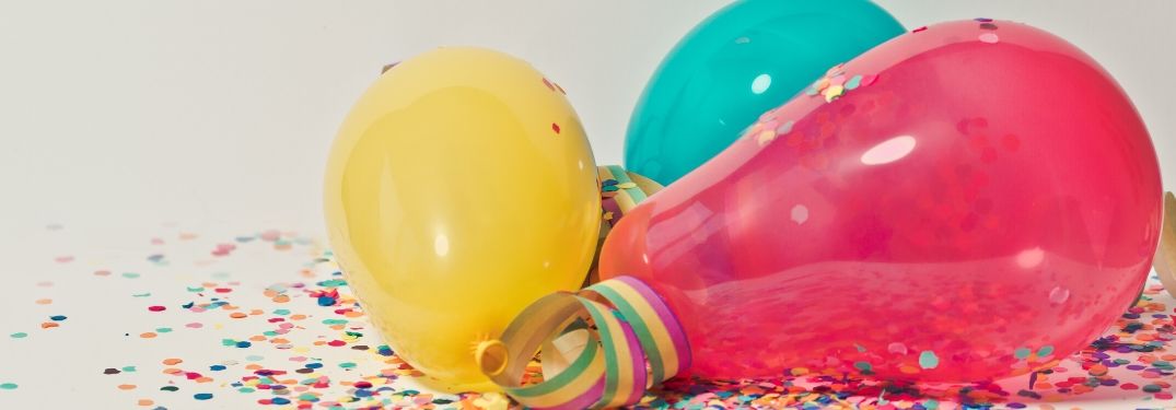colorful balloons and confetti