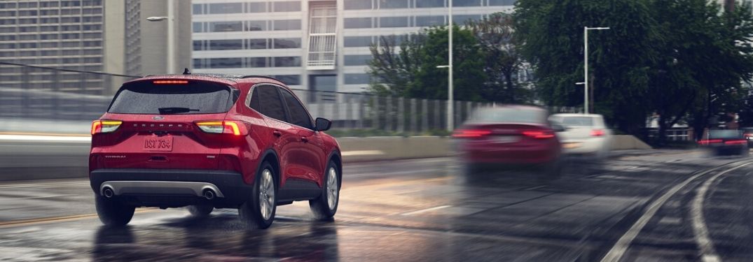 2020 Ford Escape on rain-slicked road