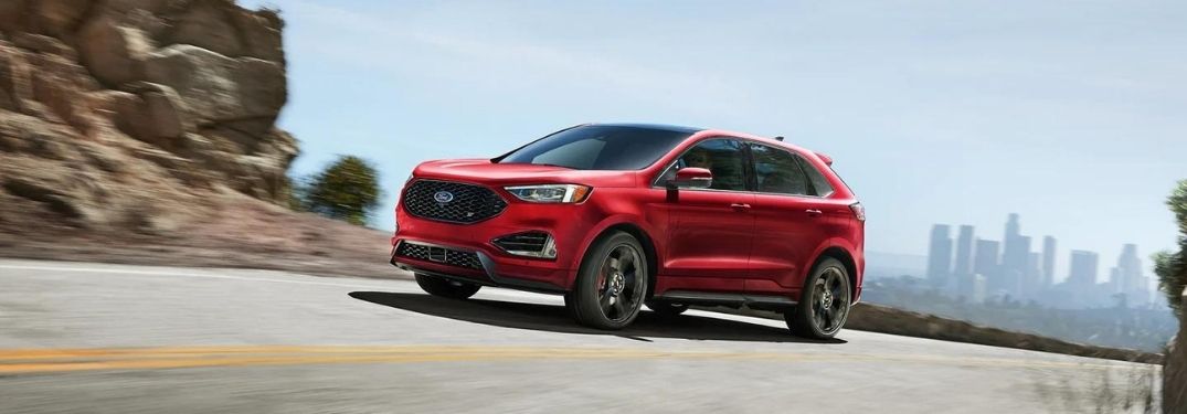 A red all-new 2022 Ford Edge on a high altitude road