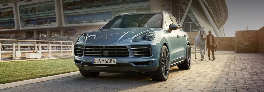 Man walking towards 2019 Porsche Cayenne