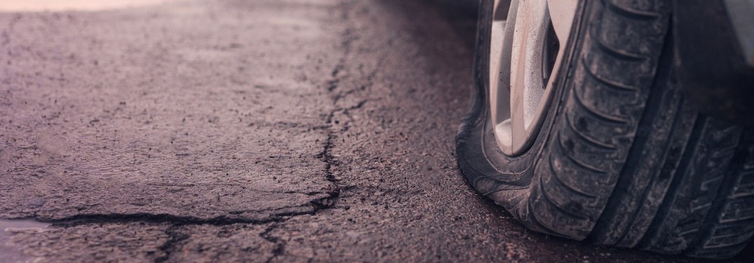 flat tire on pavement