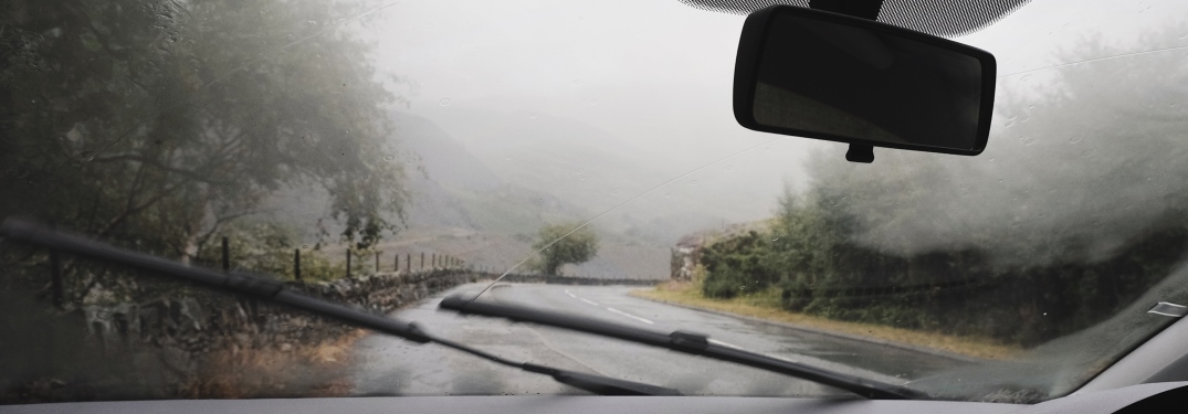 car driving in the rain