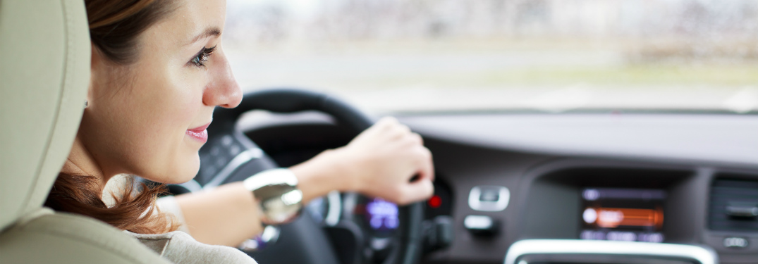 woman driving car looking to her right