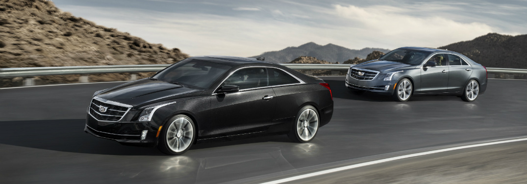 black and silver 2018 cadillac ats driving on highway