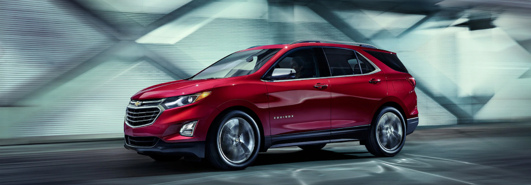 front and side view of red 2019 chevrolet equinox