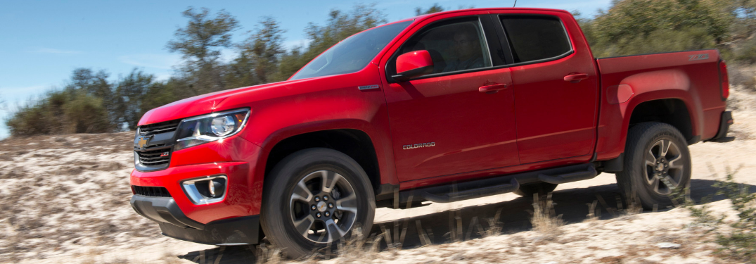 side view of red 2019 chevy colorado