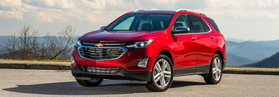 front and side view of red 2019 chevy equinox