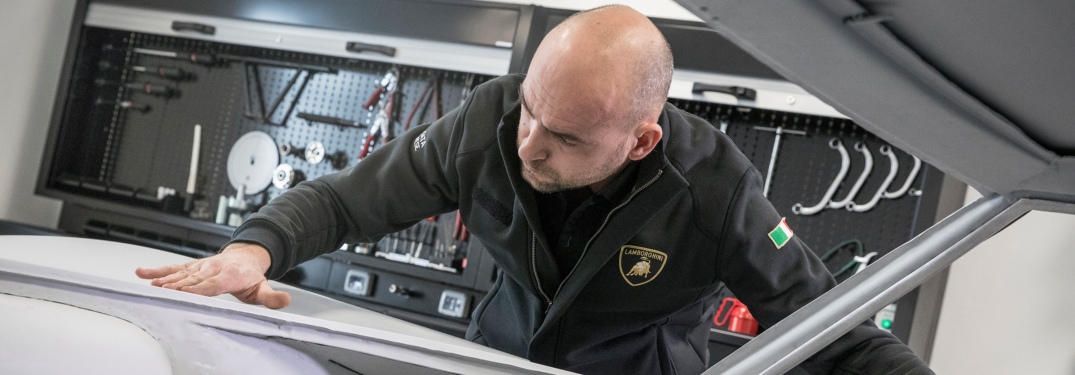Lamborghini technician working on a car