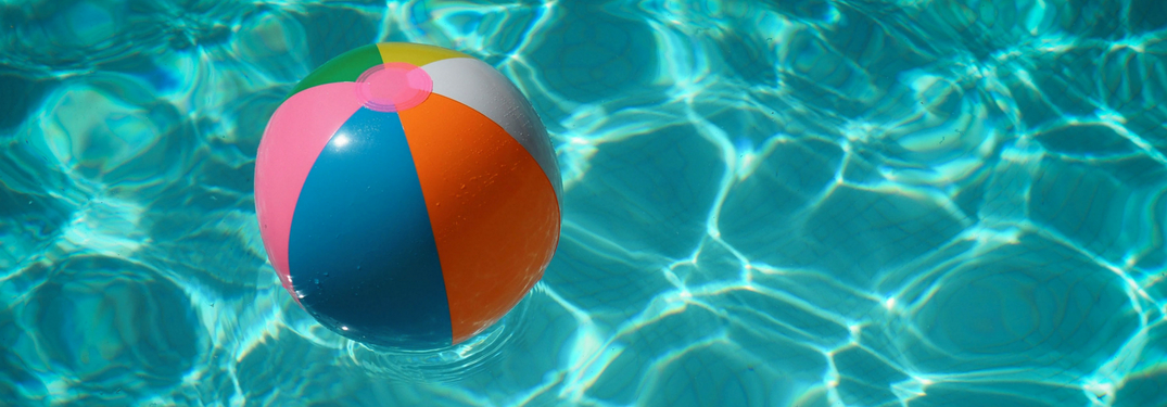 beach ball floating in pool