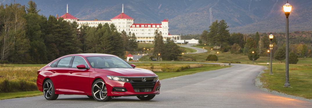 Passenger side exterior view of a red 2018 Honda Accord Sedan