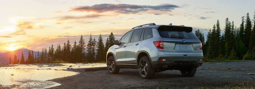 Rear driver side exterior view of a gray 2019 Honda Passport