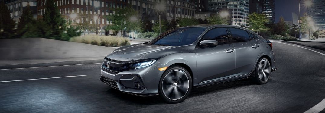 2020 Honda Civic Hatchback driving through city