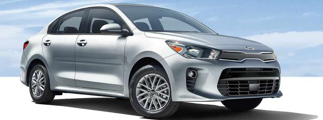 2018 Kia Rio exterior shot with blue sky parked on stark white ground