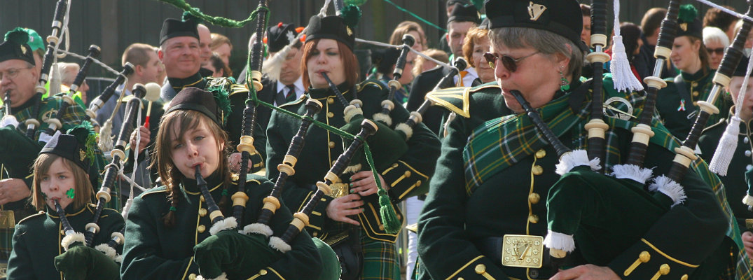 St. Patrick's Day Irishmen pipers parade march