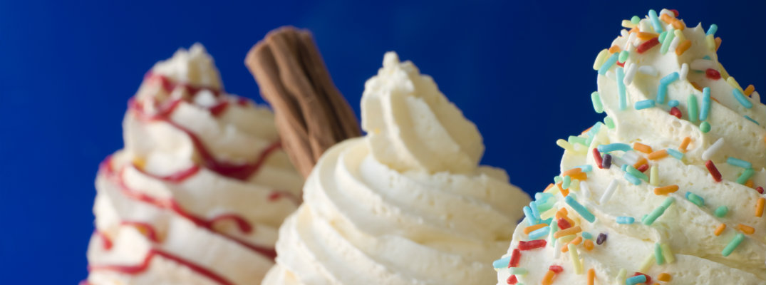 Three Ice Cream Flavors With Sprinkles against a blue background