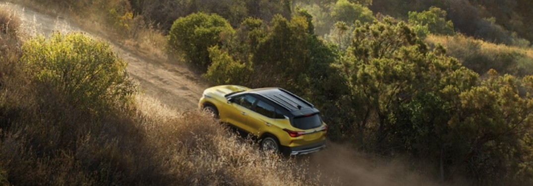 2021 Kia Seltos driving up dirt road