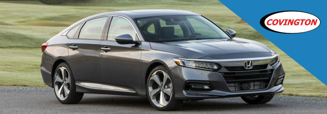 2018 Honda Accord Touring 2.0T model parked on road with Covington logo overlaid