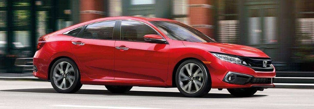 2021 Honda Civic Sedan driving on a road