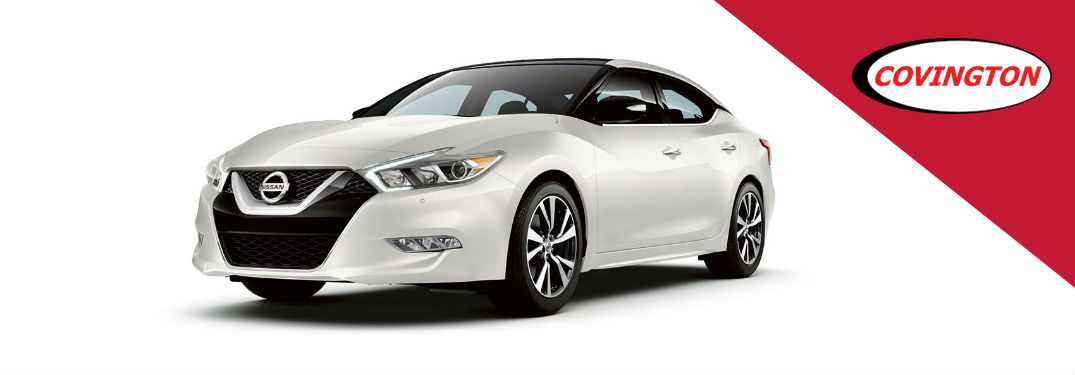2018 nissan maxima in white with covington logo in corner