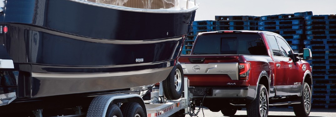 2020 Nissan TITAN towing a boat