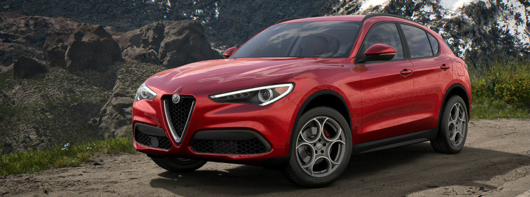 Wide shot of 2018 Alfa Romeo Stelvio parked on street
