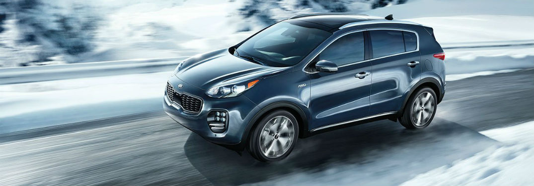 2019 Kia Sportage Performance and Specs with image of 2019 Sportage with AWD driving on a snowy road