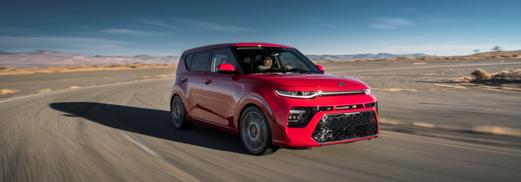 red kia soul driving