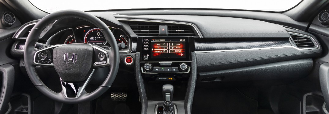 2020 Honda Civic Coupe Sport interior shot of steering wheel, transmission, and dashboard layout