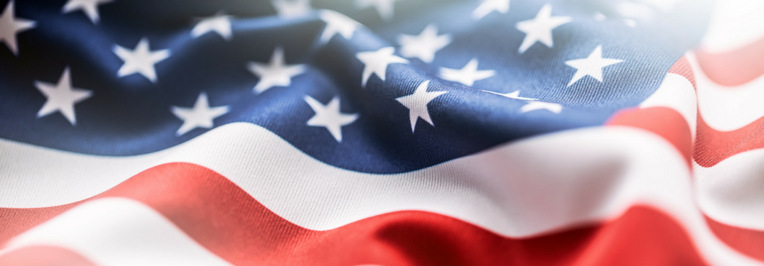 closeup of unfurling American flag