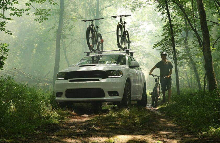 2020 Dodge Durango in white with bikes on top