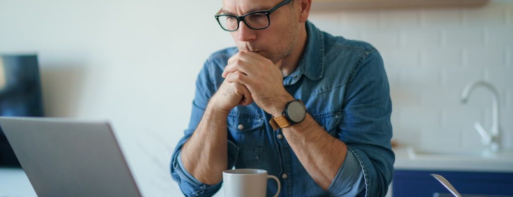 Man in front of computer